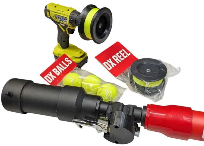DX Launcher compressed air antenna cannon with tennis balls, reel, and drill winder